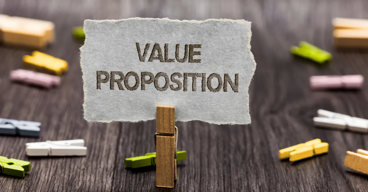 A sign with 'Value Proposition' displayed, emphasizing business positioning.