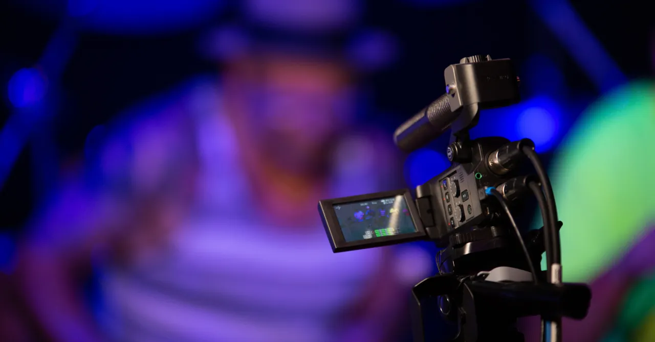 Close-up of a video camera recording content, symbolizing AI-driven promo video creation for products.