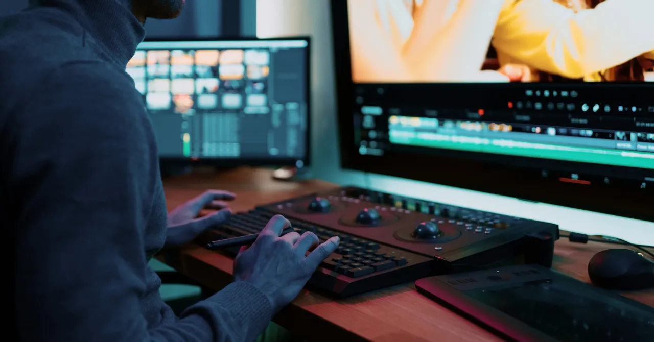 Person editing a video using advanced tools, highlighting the role of AI in creating polished, personalized promo content.