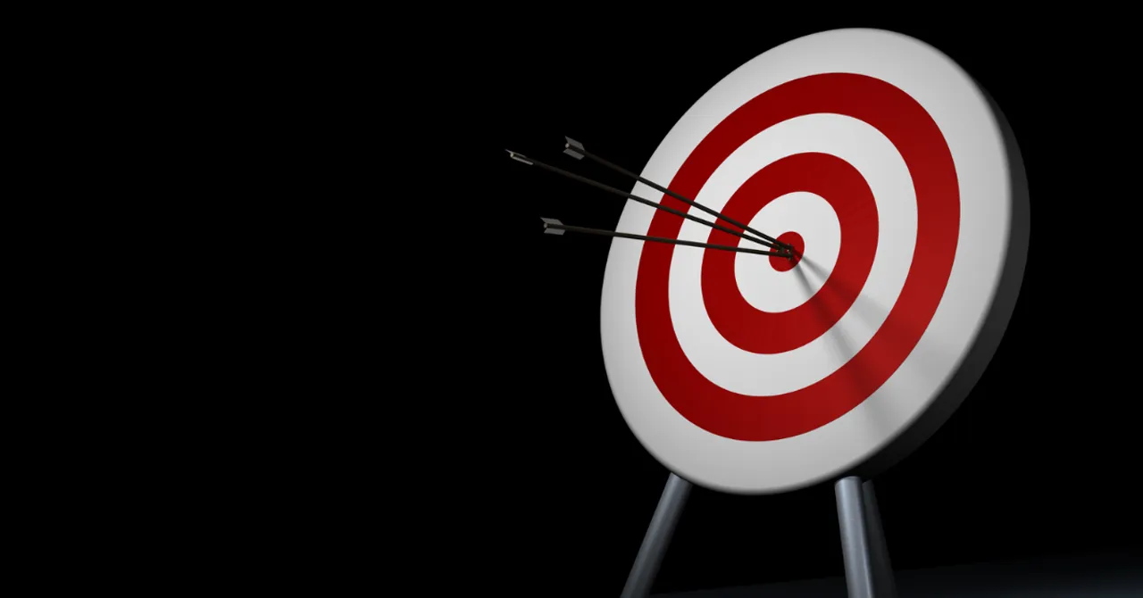A bullseye target hit by arrows — symbolizing precision marketing strategies for Shopify beauty stores to end summer strong.
