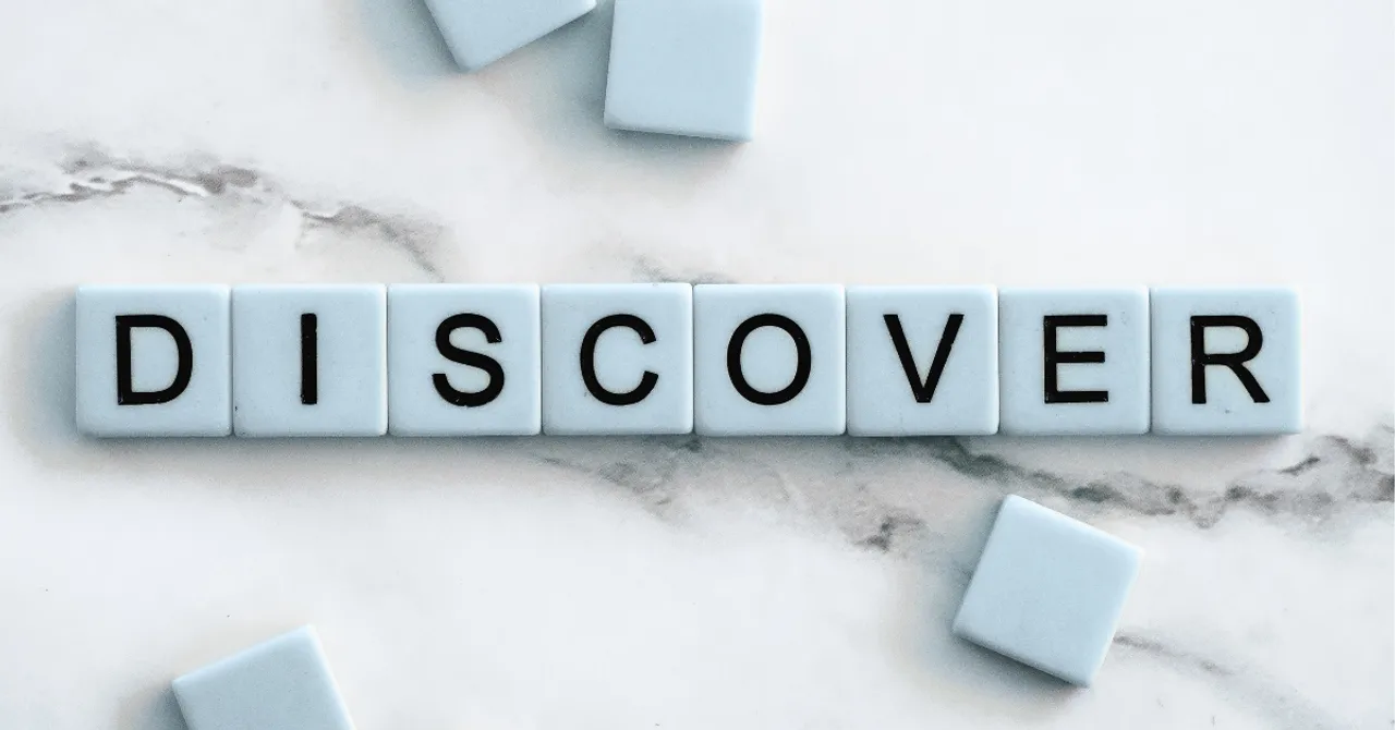 Word "DISCOVER" spelled with tile blocks.
