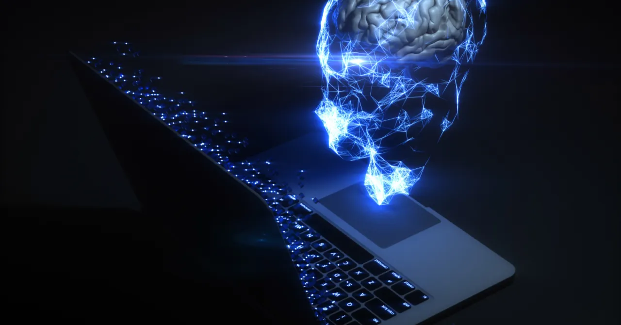 A glowing digital brain emerges from a laptop, representing how AI technology is powering intelligent, personalized sales experiences for beauty brands on Shopify.