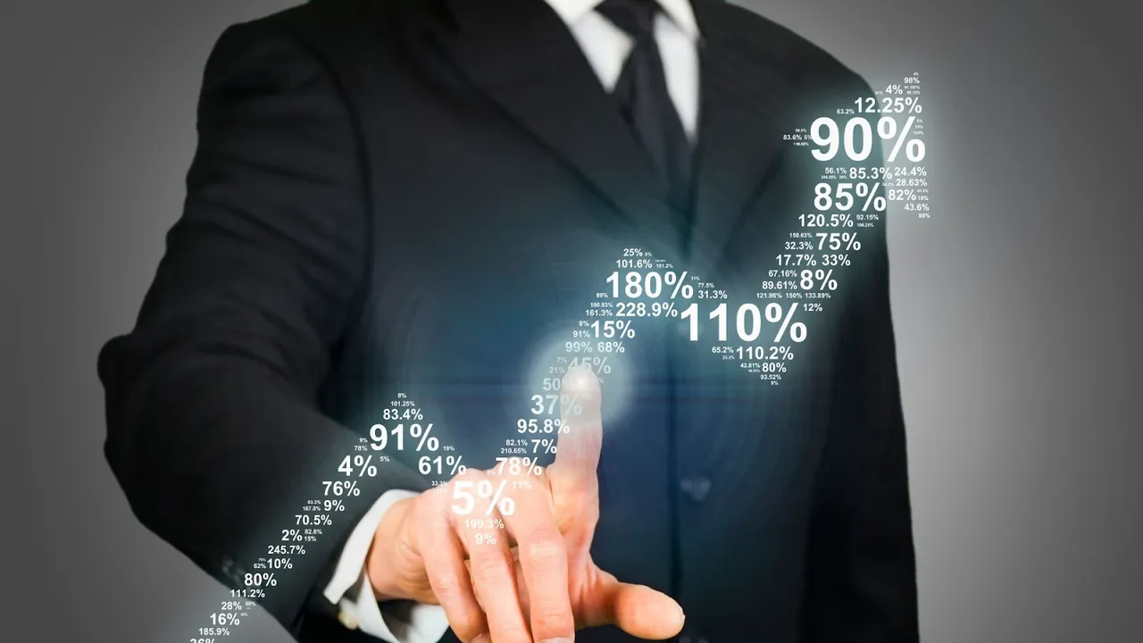 Businessman in suit interacting with virtual analytics chart representing growth percentages – symbolizing data-driven decision-making and performance optimization in customer retention strategies.