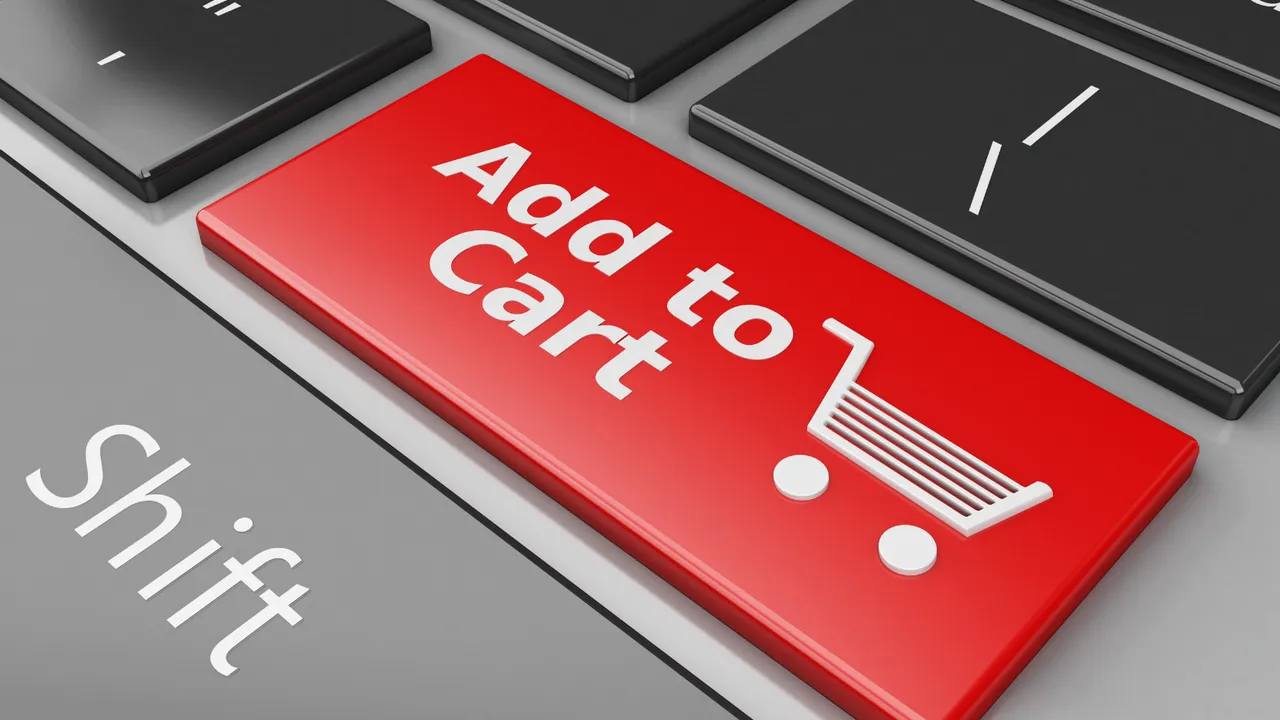 Close-up of a red "Add to Cart" button on a keyboard, symbolizing the moment when Supercart starts increasing average order value (AOV) through smart upsell techniques.